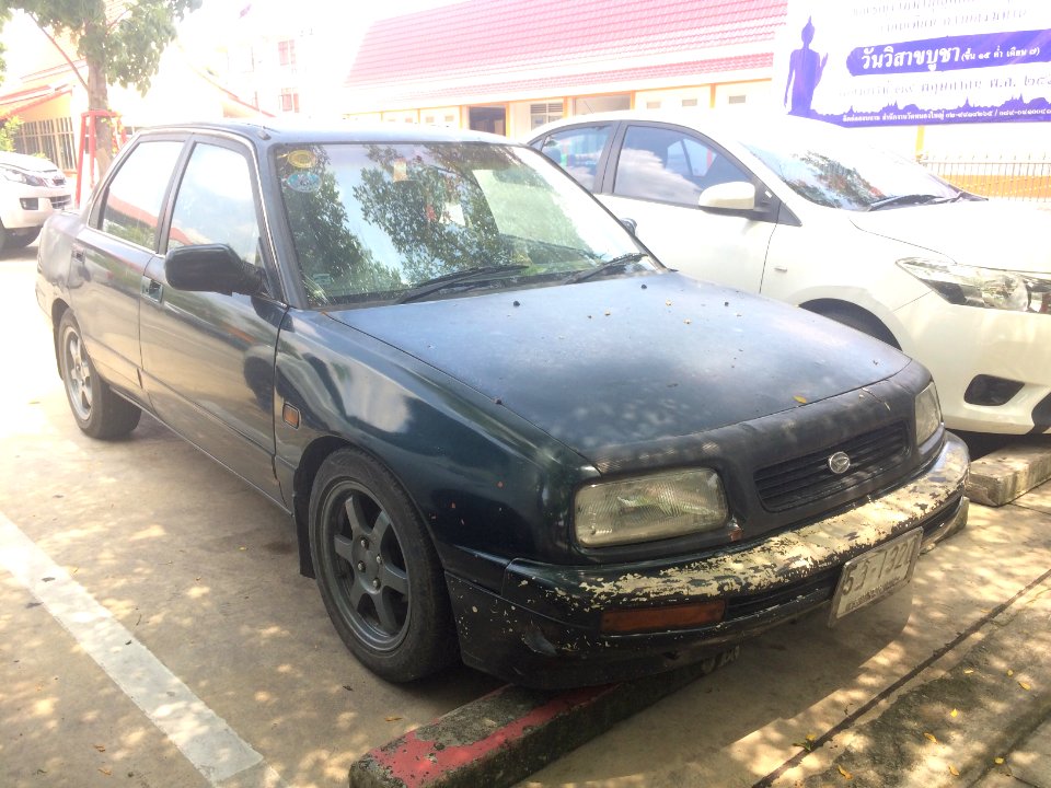 1993-1994_Daihatsu_Applause_(A101)_1.6_Xi_Liftback_(13-05-2018)_02