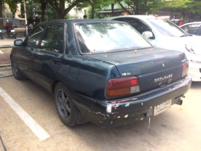 1993-1994_Daihatsu_Applause_(A101)_1.6_Xi_Liftback_(13-05-2018)_03