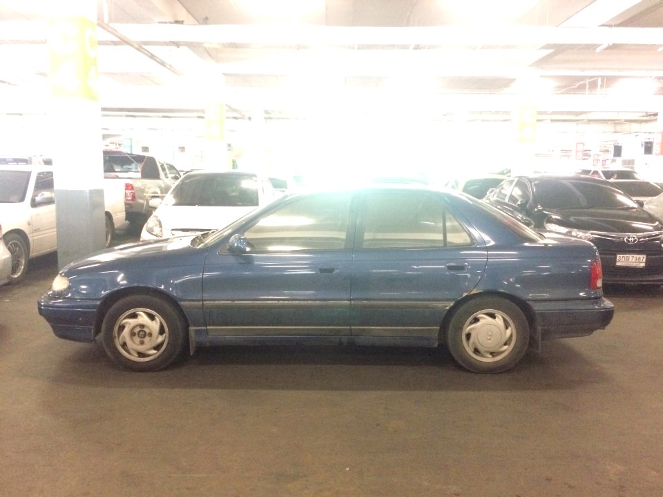 1993-1994_Hyundai_Elantra_(J1)_1.8_GT_Sedan_(12-08-2018)_05