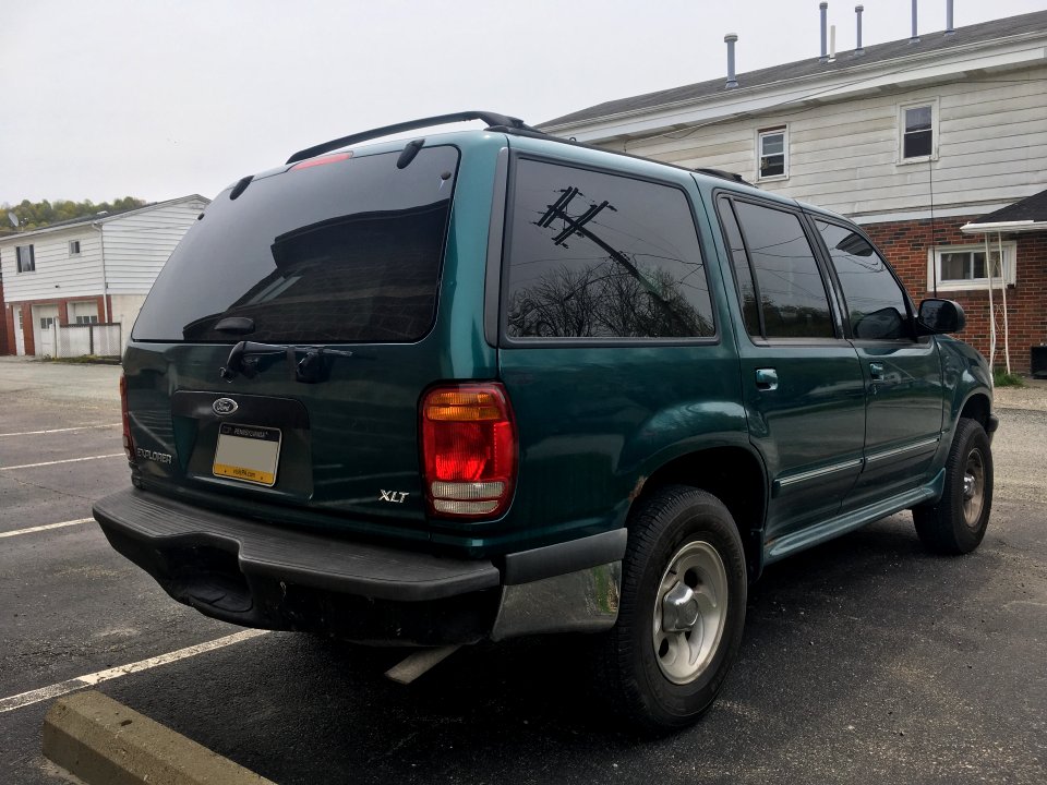 1998_Ford_Explorer_XLT_4.0L_in_Pacific_Green_Metallic,_rear_right,_4-24-2021