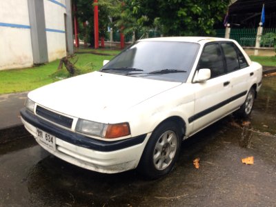 1990-1991_Mazda_323_(BG)_1.6_Sedan_(22-08-2018)_02