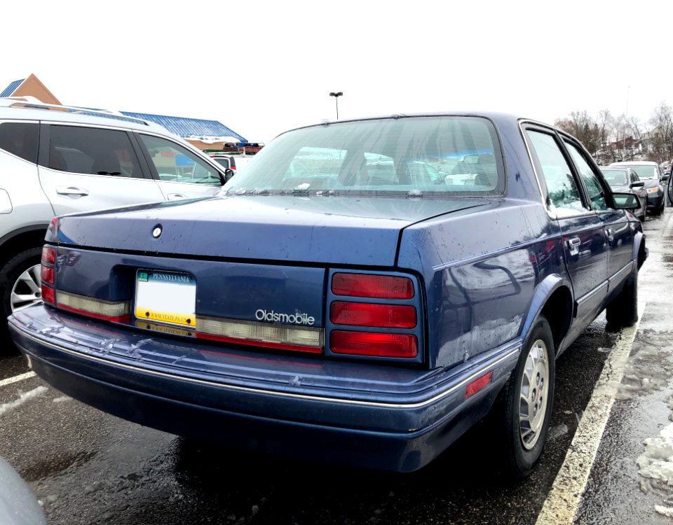 1996_Oldsmobile_Ciera_SL,_rear_right,_12-20-2020