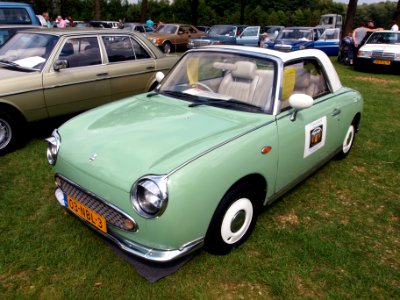 1991_Nissan_Figaro,_Dutch_licence_registration_03-NBL-3_p1