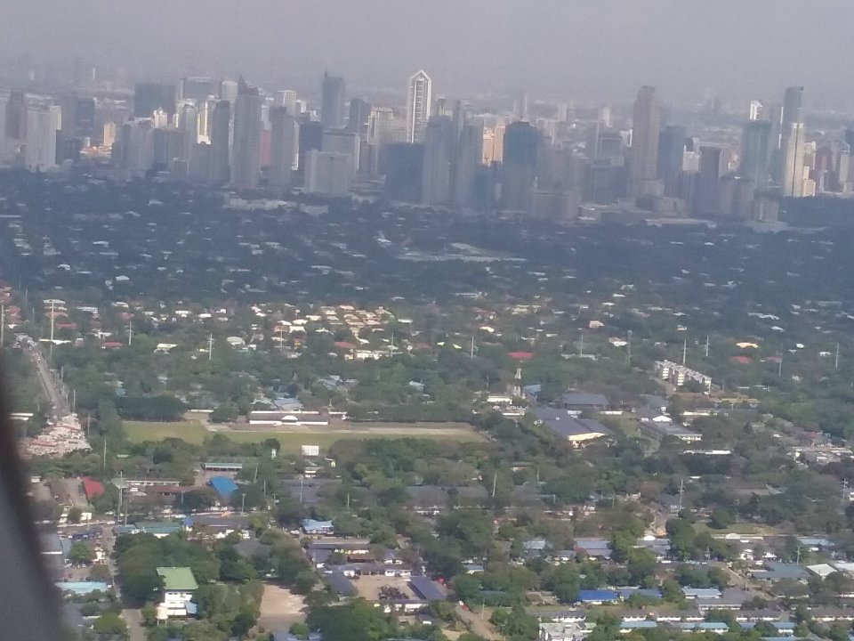 2018-01-25_Makati_Central_Business_District_from_a_Japan_Airlines_flight_departing_MNL