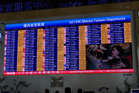 2014.10.01.110021_Board_departures_Terminal_3_Airport_Bejing photo