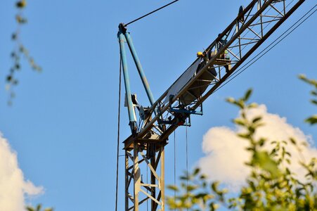 Crane arm lift loads construction work photo