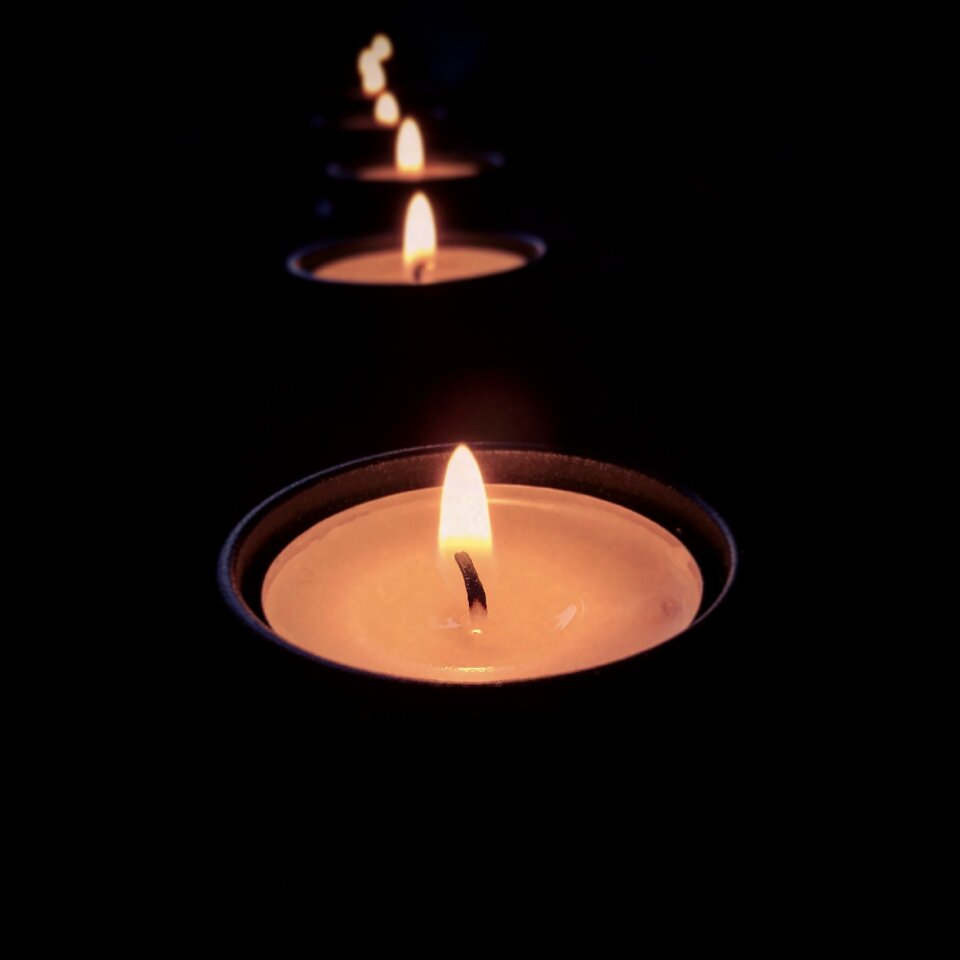 Darkness burns candles