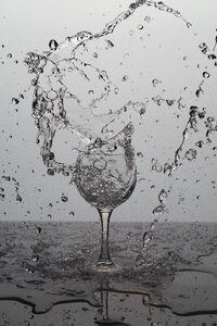 Water bubbles spray wine glass photo