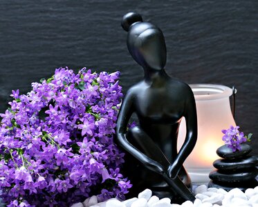 Statue beautiful woman flowers