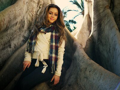 Long wavy brown hair smiling scarf
