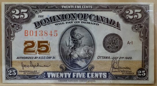 25_Cents,_Dominion_of_Canada,_1923_-_Bank_of_Montréal_Museum_-_Bank_of_Montreal,_Main_Montreal_Branch_-_119,_rue_Saint-Jacques,_Montreal,_Quebec,_Canada_-_DSC08470