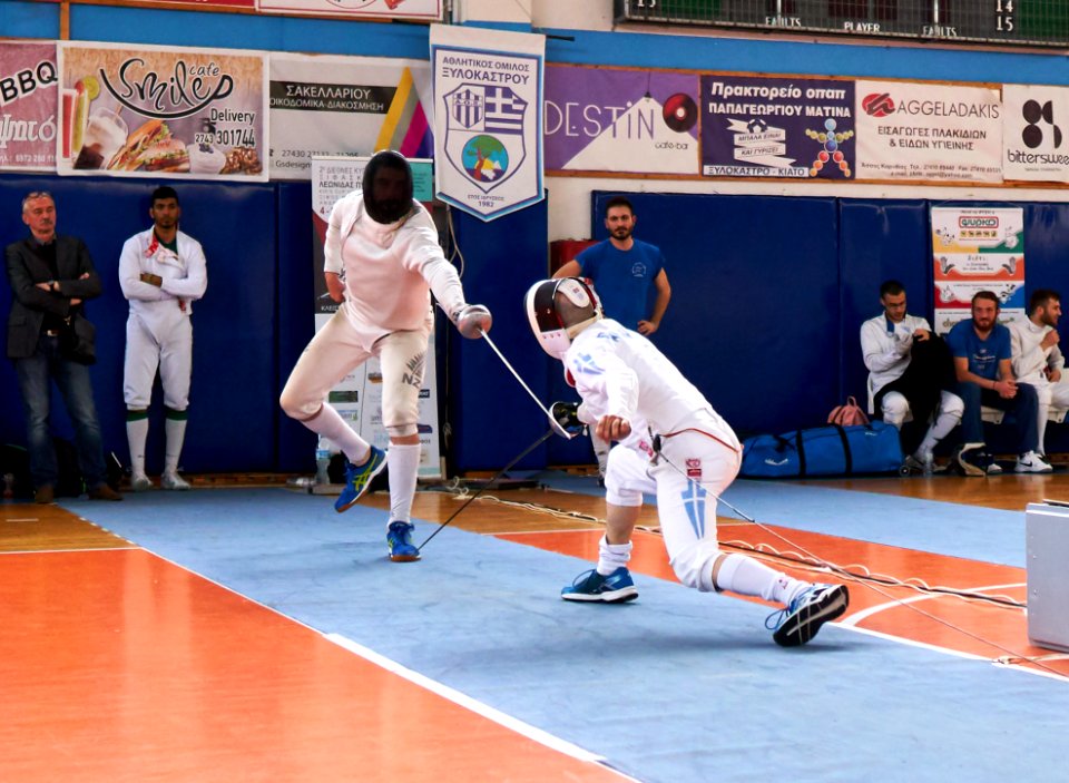 2nd_Leonidas_Pirgos_Fencing_Tournament._Vasilios_Papadopoulos_scores_a_foot_touch_against_Matthew_Baker
