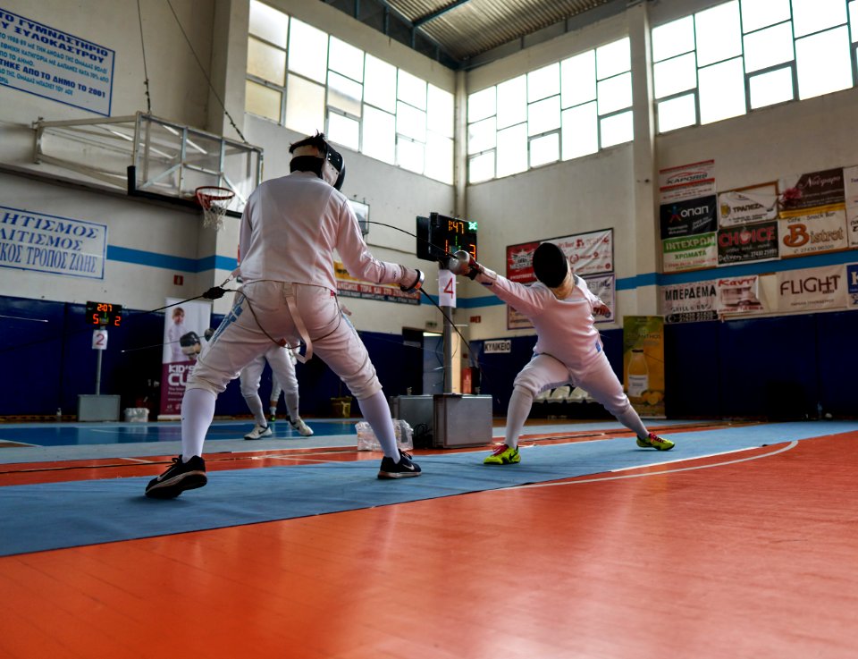 2nd_Leonidas_Pirgos_Fencing_Tournament._The_fencer_George_Panagiotakopoulos_performs_an_advance_lunge_and_scores_a_touch