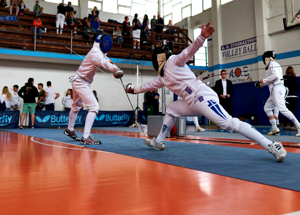 2nd_Leonidas_Pirgos_Fencing_Tournament._The_fencer_on_the_left_is_about_to_score_a_foot_touch