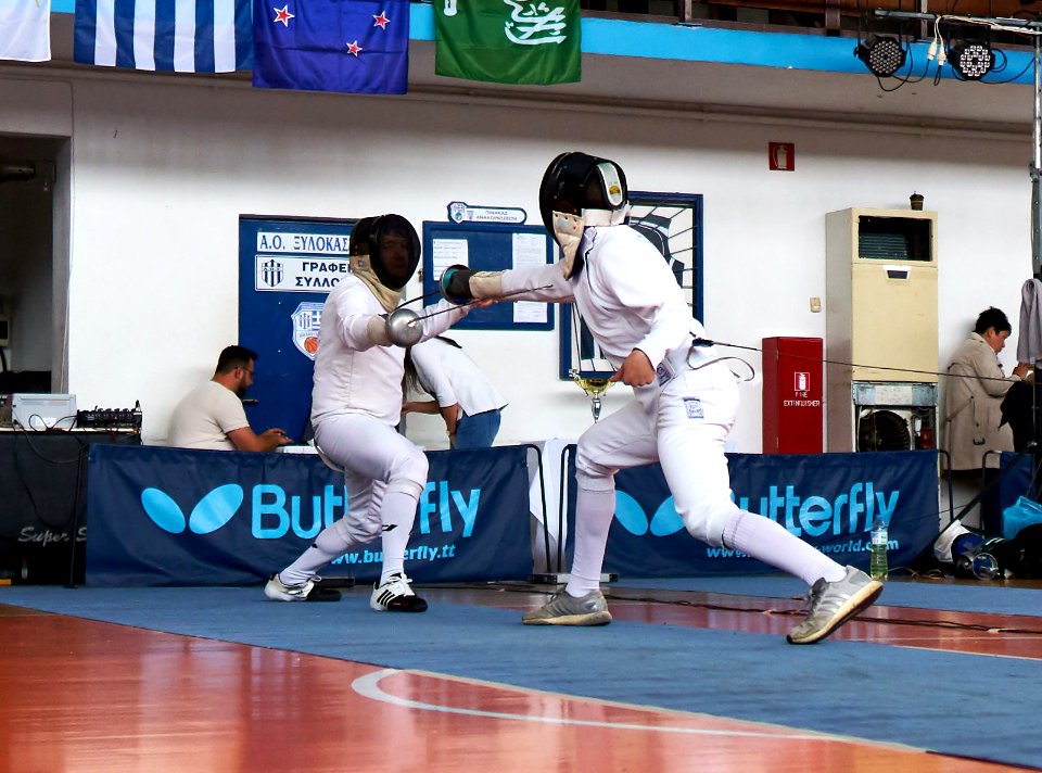 2nd_Leonidas_Pirgos_Fencing_Tournament._Extension_and_touch_for_the_fencer_on_the_right