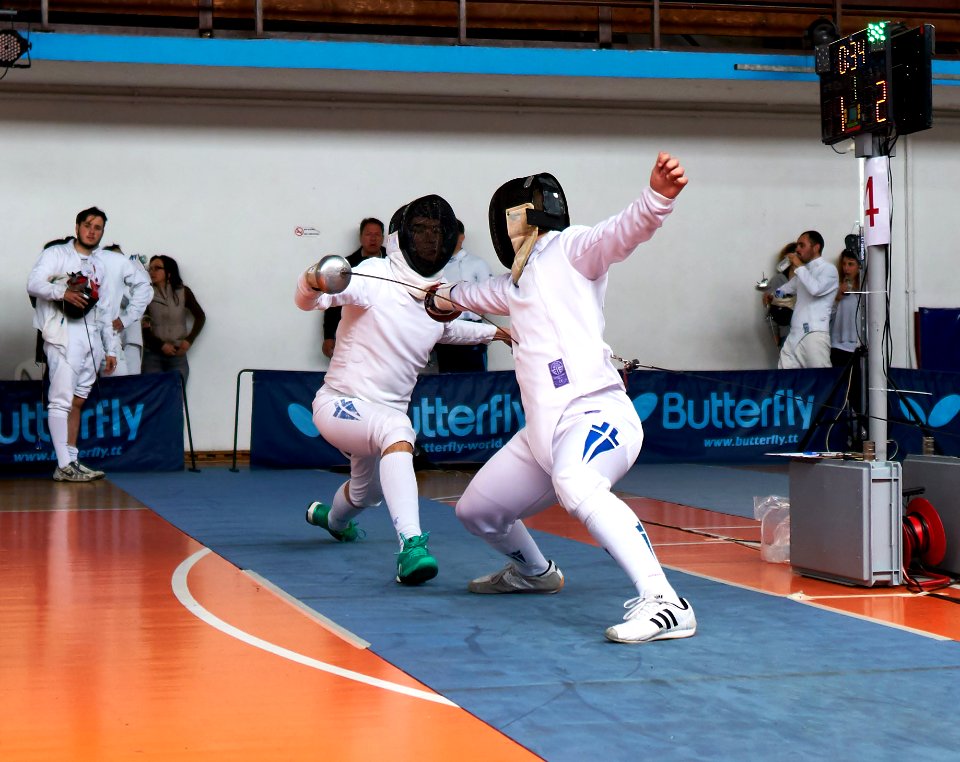 2nd_Leonidas_Pirgos_Fencing_Tournament._The_fencer_on_the_right_performs_a_counter-attack_and_scores_a_touch