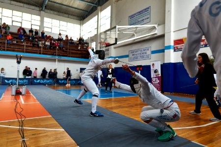 2nd_Leonidas_Pirgos_Fencing_Tournament._The_fencer_Haris_Levantides_performs_a_displacement photo
