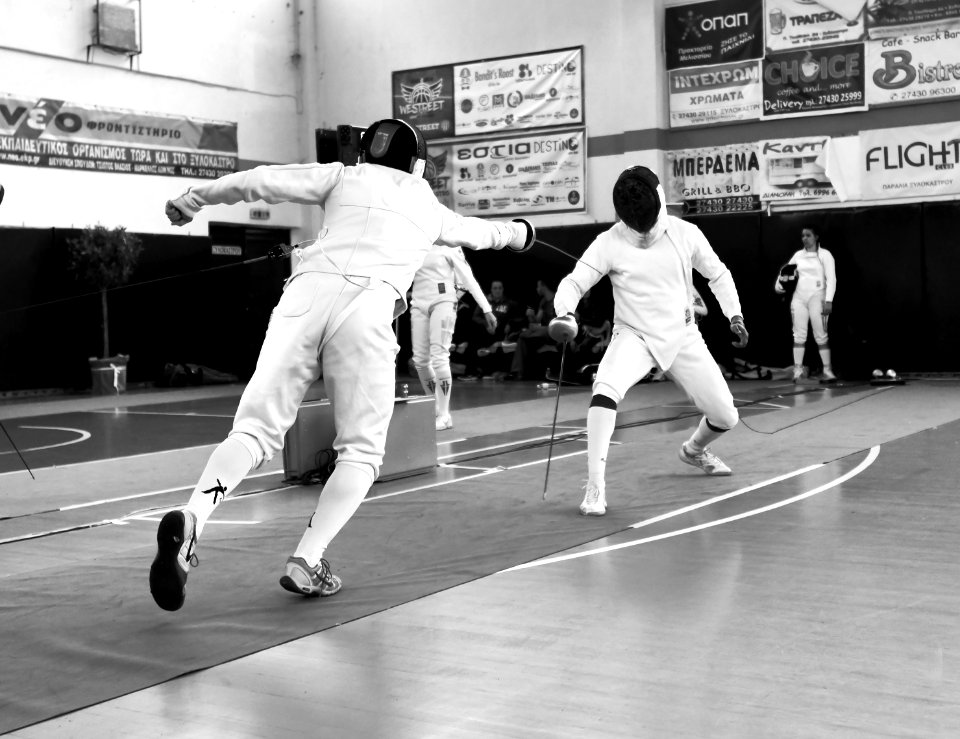 2nd_Leonidas_Pirgos_Fencing_Tournament._The_fencer_Dimitrios_Makris_performs_a_flèche_and_scores_a_touch
