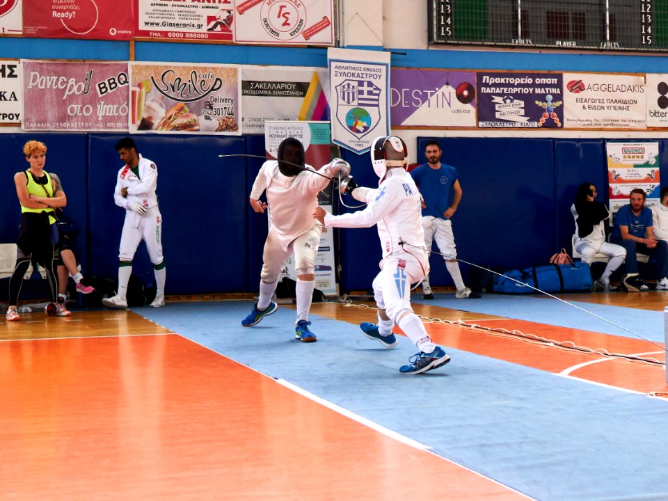 2nd_Leonidas_Pirgos_Fencing_Tournament._Matthew_Baker_lunges_the_parry_of_Vasilios_Papadopoulos