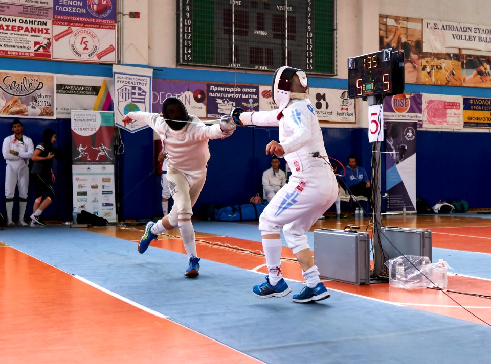 2nd_Leonidas_Pirgos_Fencing_Tournament._Vasilios_Papadopoulos_counter-attacks_the_flèche_of_Matthew_Baker