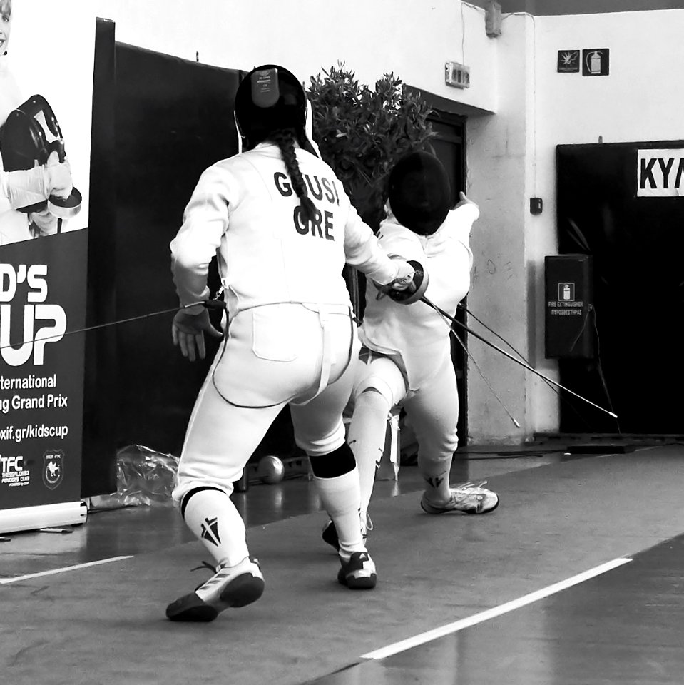 2nd_Leonidas_Pirgos_Fencing_Tournament._Lunge_by_Nefeli_Rodopoulou,_8th_parry_by_Eleanna_Gousi