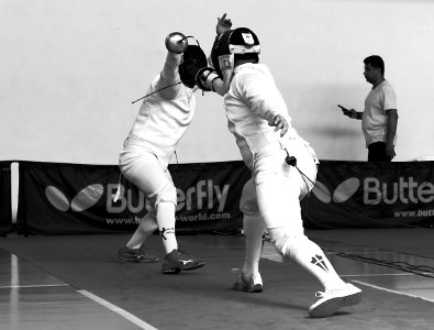 2nd_Leonidas_Pirgos_Fencing_Tournament._Lunge_by_the_fencer_on_the_right,_counter-attack_by_Ilias_Konstantinidis