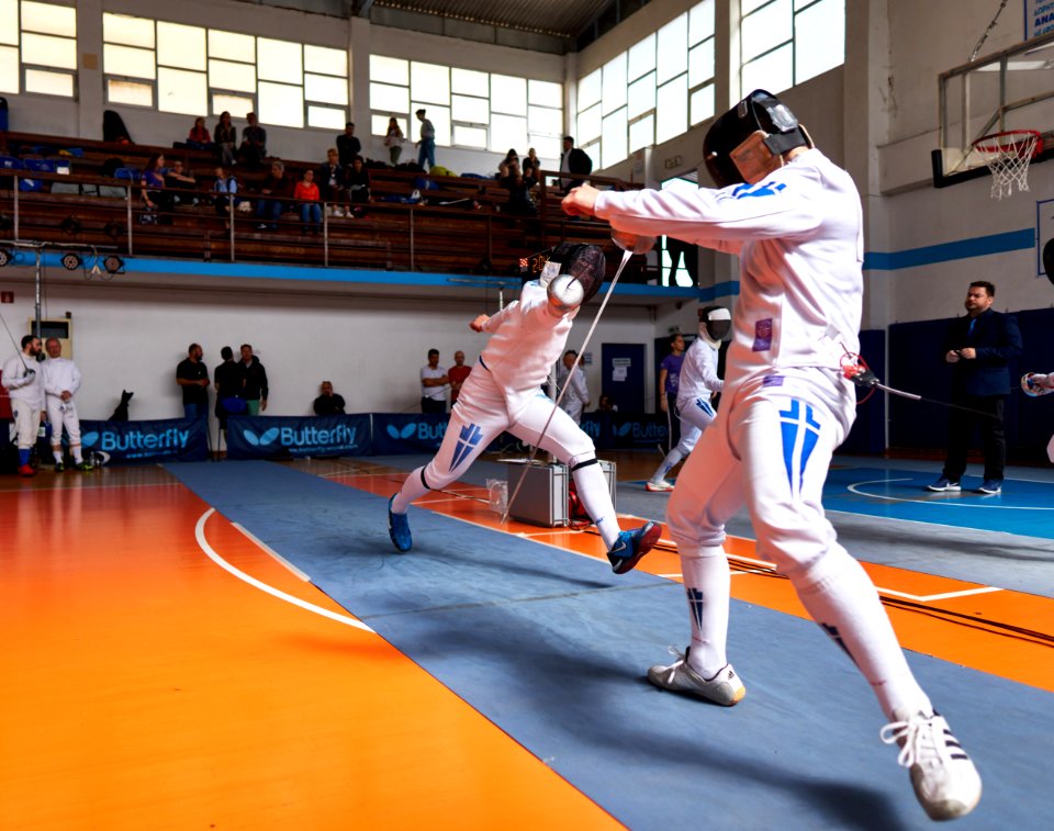 2nd_Leonidas_Pirgos_Fencing_Tournament._Flèche_and_touch_by_the_fencer_on_the_left