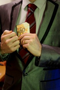 8_-_man_in_suit_with_50_euro_banknotes_in_right_lapel_pocket_-_royalty_free,_without_copyright,_public_domain_photo_image