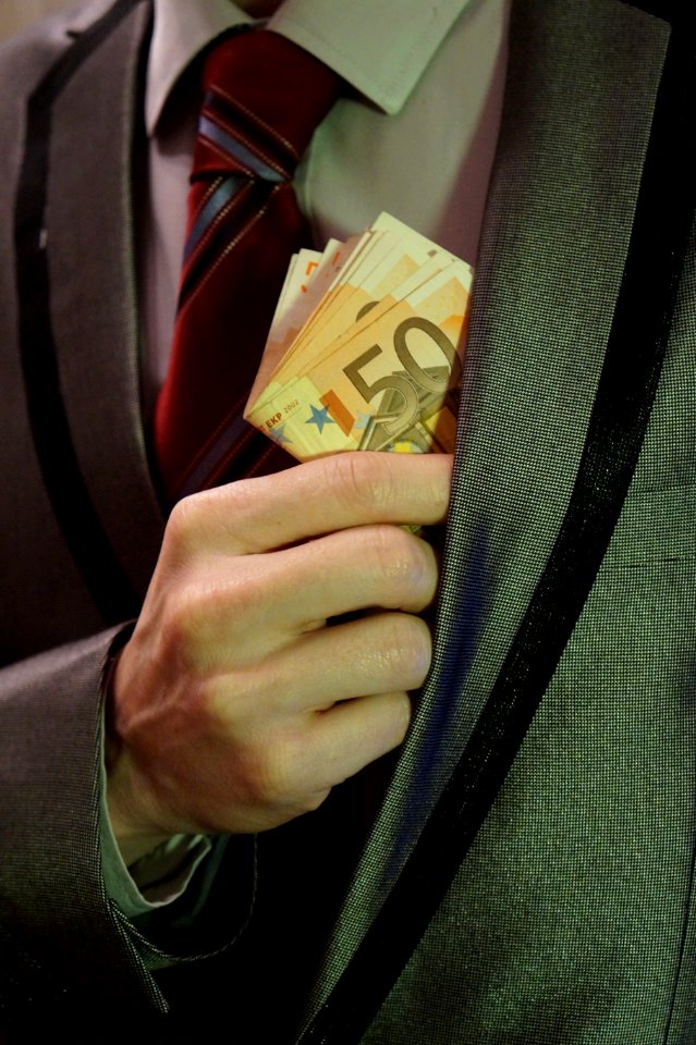 7_-_man_in_suit_with_50_euro_banknotes_in_left_lapel_pocket_-_royalty_free,_without_copyright,_public_domain_photo_image