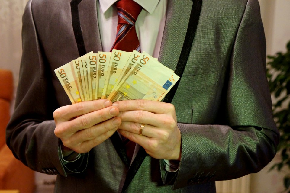 5_-_man_in_suit_holding_euro_banknotes_-_royalty_free,_without_copyright,_public_domain_photo_image