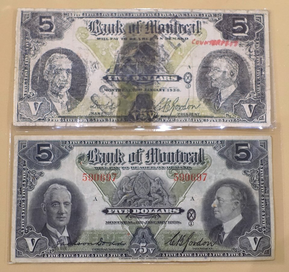 5_Dollars,_Bank_of_Montreal,_1938,_with_counterfeit_-_Bank_of_Montréal_Museum_-_Bank_of_Montreal,_Main_Montreal_Branch_-_119,_rue_Saint-Jacques,_Montreal,_Quebec,_Canada_-_DSC08447