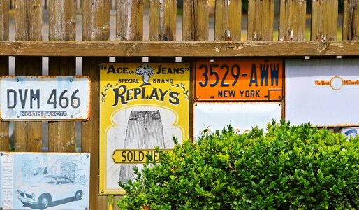 Metal sign advertising sign fence