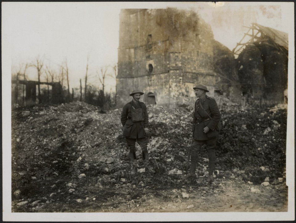 A_Brigadier_and_one_of_his_Staff_Officers_in_a_ruined_village,_Bestanddeelnr_158-1685