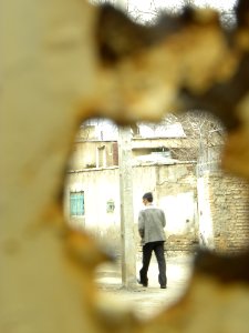 A_man_walking_-_view_from_Old_Ferrous_Door_-_Nishapur