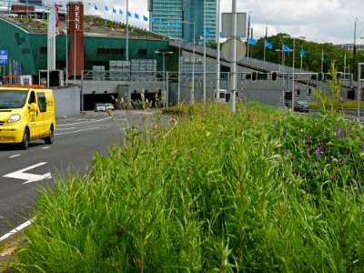 A_view_on_the_NEMO-museum,_including_the_entrance_road_of_the_IJ-tunnel_in_Amsterdam,_FotoDutch,_2013 photo