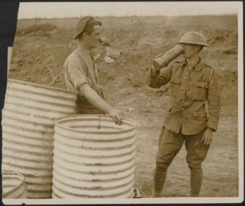 A_shell_case_used_as_a_drinking_cup.,_Bestanddeelnr_158-2056