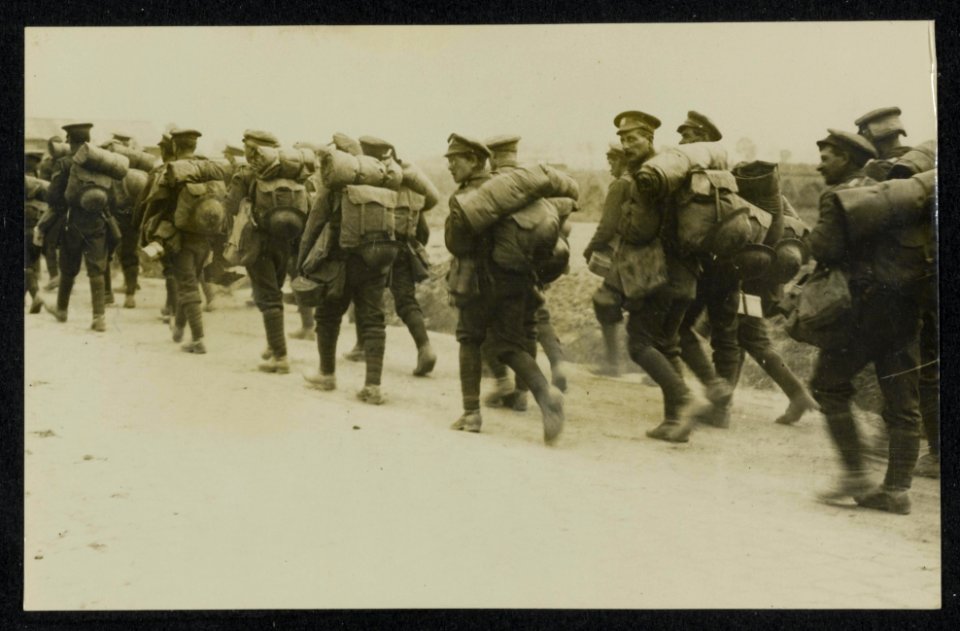 A_scene_on_the_road._A_British_labour_Battalion_along_a_road_in_Flanders,_Bestanddeelnr_158-1364