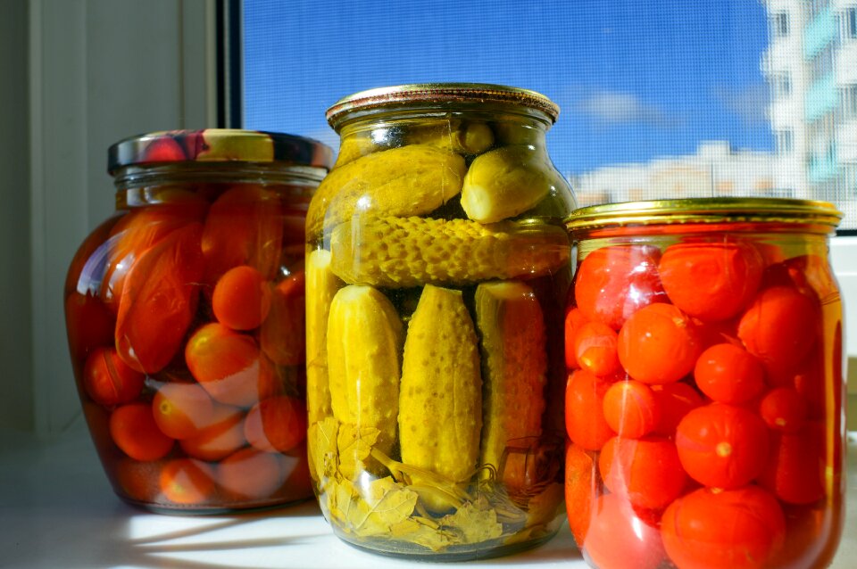 Canned tomatoes glass jars conservation
