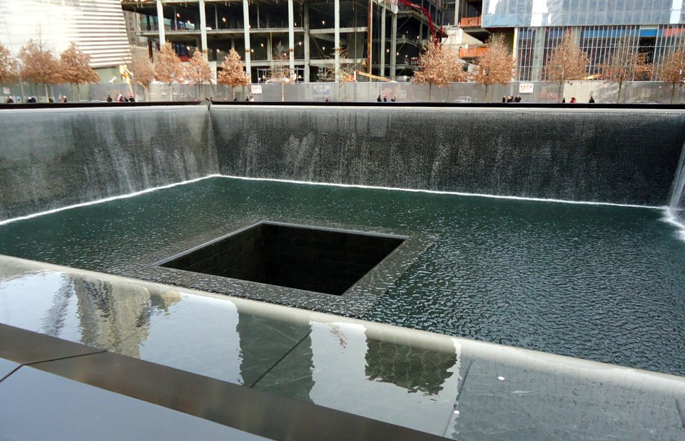 911_Memorial_pool_with_water_flowing_and_people_watching