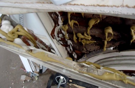 9_Irving_A_2014_fixing_broken_fireplace_mantle_glue_about_to_be_pushed_shut