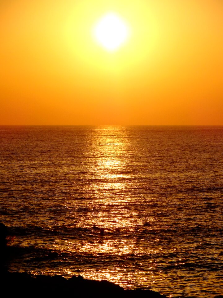 Summer ocean sunset on the sea photo