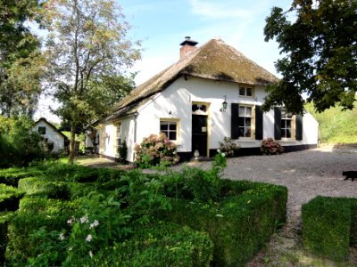 Afferden_(Druten)_Rijksmonument_14156_(vanaf_de_tuin)_Waalbandijk_68