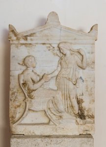 Aegina_funerary_relief_rich_style_dexiosis_5th_century_BCE
