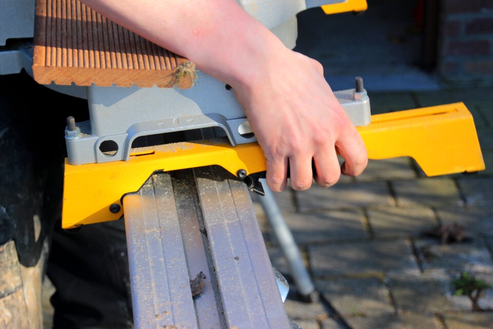 Rail of the crosscut saw engage wooden board