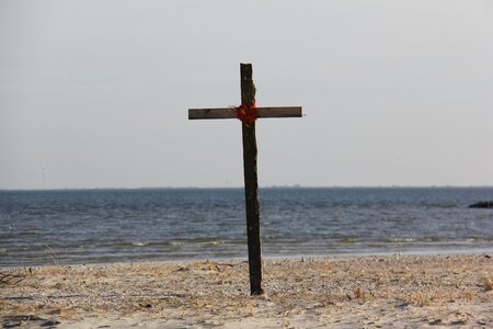 Cross sky by the sea