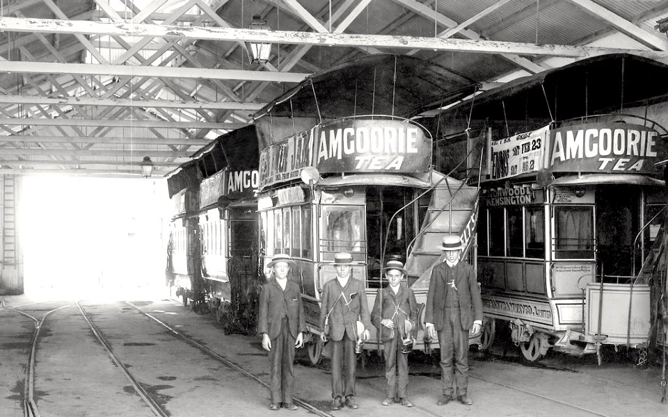 Adelaide_horse_trams_and_young_conductors_at_Adelaide_and_Suburban_Tramway_Co._Kensington_tram_shed_ca_1905_(SLSA_PRG-280-1-4-62)