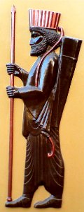 Achaemenid_Spear_Soldier_statue_on_a_residental_apartment_wall_-_Nishapur_1