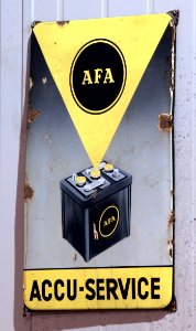 AFA accu-service enamel advert sign at the den hartog ford museum