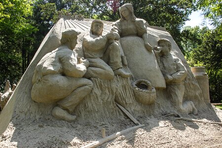 Sand sculpture family