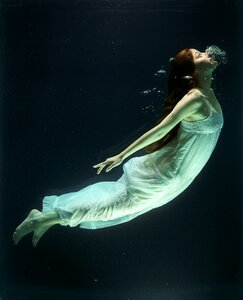 Underwater diving exhaling photo